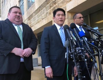 U.S. Attorney Robert Hur (center) discusses the charges against Christopher Hasson with Art Walker (left) of the Coast Guard investigative service, and FBI special agent Gordon Johnson last month.