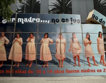 A billboard built by sex education advocates outside Mexico’s National Population Council office, in Mexico City, warns that ‘being a mother is not child’s play.’ (Rebecca Blackwell/AP Photo)