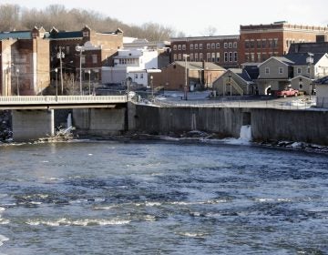 In this Jan. 21, 2016 file photo, the Hoosic River runs through the village of Hoosick Falls, N.Y. No higher incidences of certain types of cancer linked to the toxic chemical PFOA were found in the upstate New York village whose water supplies were contaminated by the chemical, state health officials said in a report released Wednesday, June 7, 2017. (Mike Groll/AP Photo)