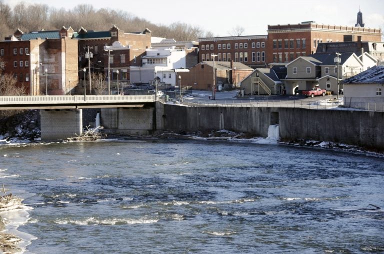 In this Jan. 21, 2016 file photo, the Hoosic River runs through the village of Hoosick Falls, N.Y. No higher incidences of certain types of cancer linked to the toxic chemical PFOA were found in the upstate New York village whose water supplies were contaminated by the chemical, state health officials said in a report released Wednesday, June 7, 2017. (Mike Groll/AP Photo)