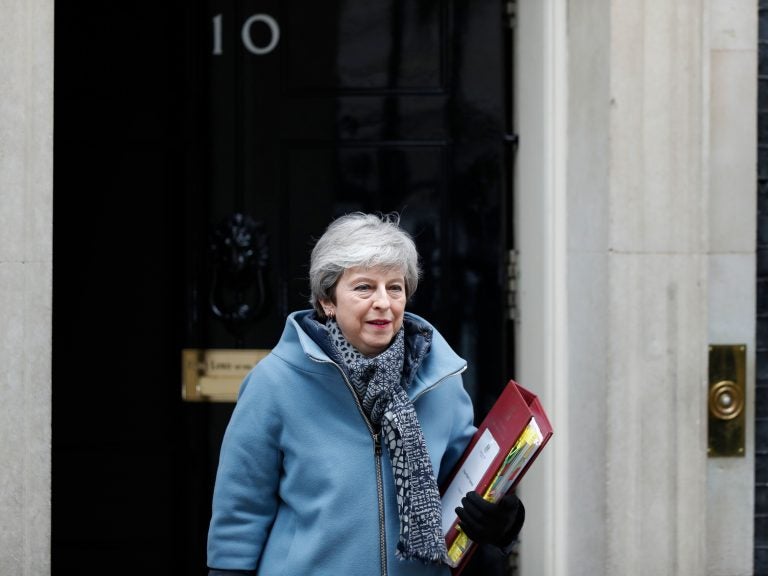 Britain's Prime Minister Theresa May walks out 10 Downing street in London on Wednesday. She announced that if her Brexit deal is approved by Parliament, she will step down from her post. (Adrian Dennis/AFP/Getty Images)