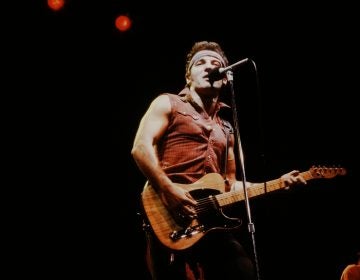 Bruce Springsteen onstage during the Born in the U.S.A. Tour in 1984. (Shinko Music/Getty Images)