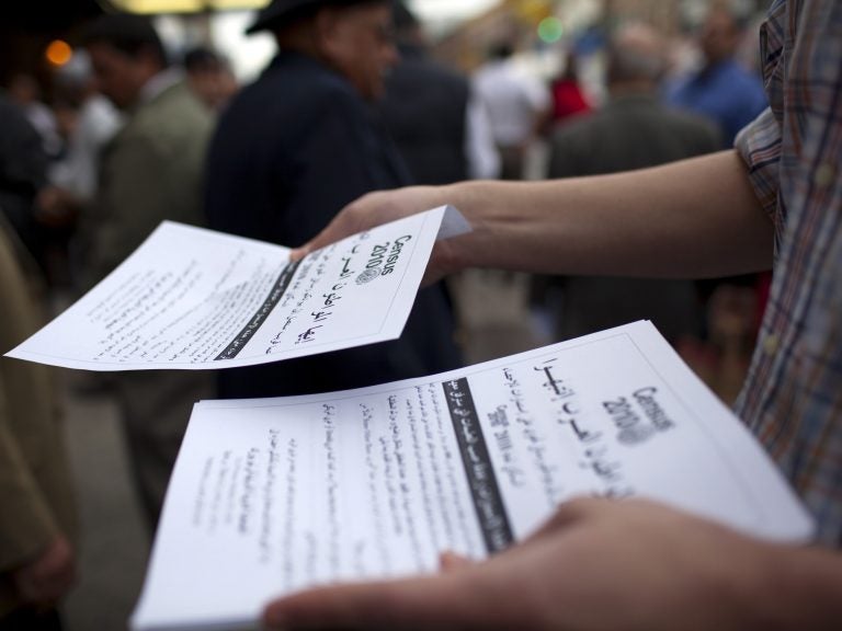 Worshippers exiting a mosque in the Bay Ridge neighborhood of Brooklyn, N.Y., are handed fliers encouraging participation in the 2010 census. Worshippers exiting a mosque in the Bay Ridge neighborhood of Brooklyn, N.Y., are handed fliers encouraging participation in the 2010 census. (Robert Nickelsberg/Getty Images)