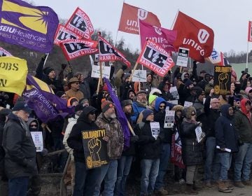 Union members and activists protest over contract negotiations with Wabtec Corporation in Wilmerding, Pa., on March 6. Many are workers from one of the company's facilities in Erie County, which flipped from voting for Barack Obama to Donald Trump in 2016. (Don Gonyea/NPR)