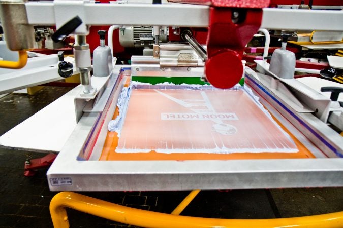 A screen printing work in progress at Pink’s Inks located in the Globe Dye Works building. (Kimberly Paynter/WHYY)