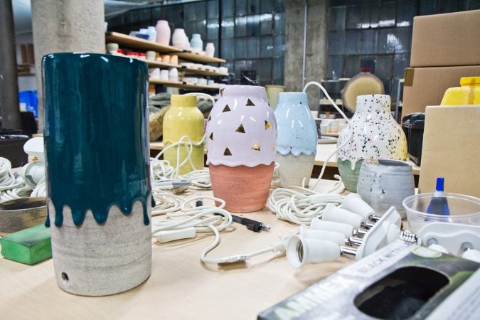 Custom lamps by Giniewski Ceramics at the Globe Dye Works building. (Kimberly Paynter/WHYY)