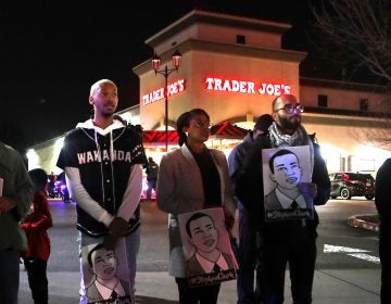 Demonstrators stand near a Trader Joe's grocery Monday night, protesting the decision to not charge Sacramento police officers who shot and killed Stephon Clark last year. Protesters also marched into a nearby neighborhood; police arrested 84 people. (Justin Sullivan/Getty Images)