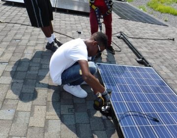 Student trainees receive hands-on experience in solar installation under the supervision of practitioners provided by Philadelphia-based company Solar States. (Courtesy of the Philadelphia Energy Authority)
