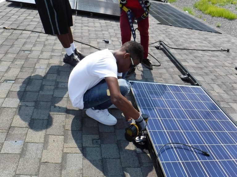 Student trainees receive hands-on experience in solar installation under the supervision of practitioners provided by Philadelphia-based company Solar States. (Courtesy of the Philadelphia Energy Authority)