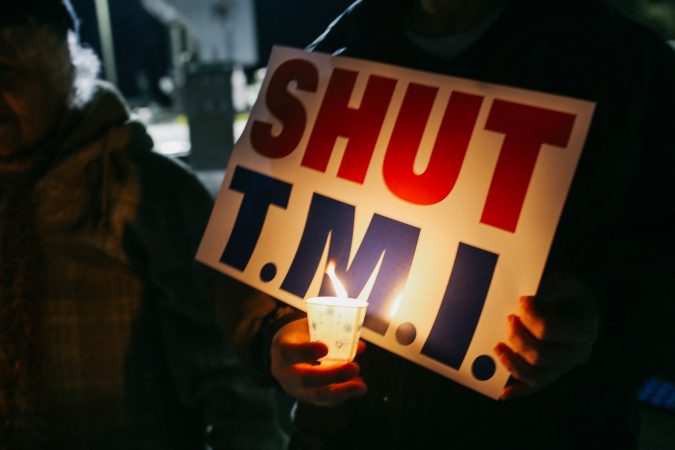 Protesters gather for a vigil outside the north gate of the Three Mile Island nuclear power plant in Londonderry Township, Dauphin County. (Tim Lambert/WITF)