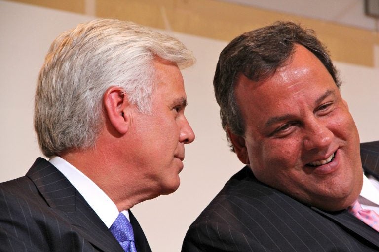 George Norcross III leans in to talk to New Jersey Gov. Chris Christie during an event at Cooper Medical Center in Camden, where Norcross is Chairman of the Board.