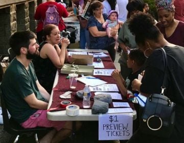 Curio Theatre Company sells $1 tickets at the Baltimore Avenue Dollar Stroll in June 2018. (Courtesy of Curio Theatre Co.)