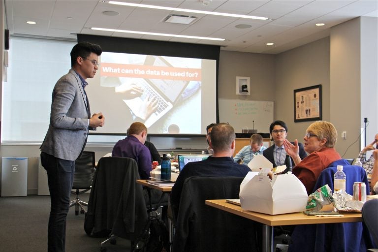 Martin Diego Garcia of 314 Action teaches a  room full of scientists about using data in political campaigns. The class was part of a two-day training session put on by 314 Action. (Emma Lee/WHYY)