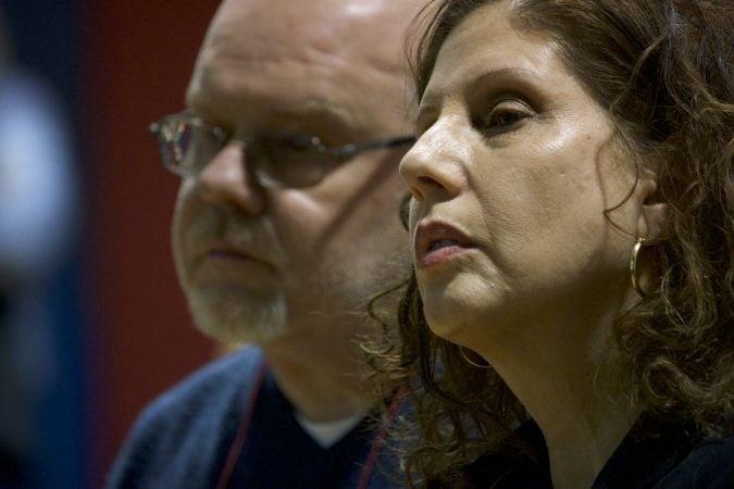 Jose Benitez, Director of Prevention Point and Ronda Goldfein, represent Safehouse during a community meeting at the Heitzman Rec Center on Thursday night. (Bastiaan Slabbers for WHYY)