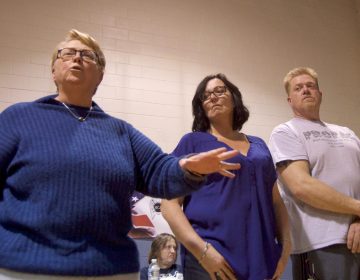 A group of leaders from the local community speak out against plans for a supervised injection facility during a community meeting at the Heitzman Rec Center on Thursday night. (Bastiaan Slabbers for WHYY)