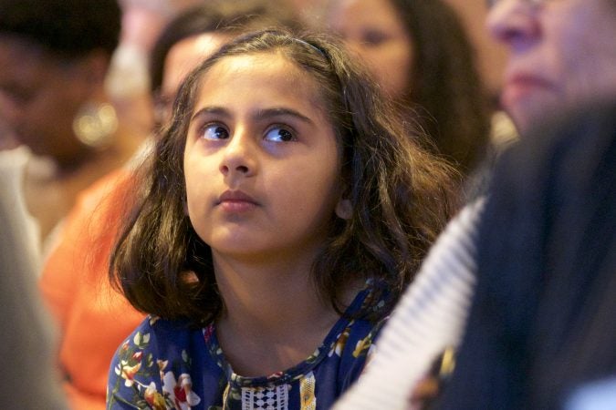 Talia Seshasai, 9 of Haddonfield, N.J. is all ears during Stacey Abrams' Radio Times interview, at WHYY, on Friday. (Bastiaan Slabbers for WHYY)