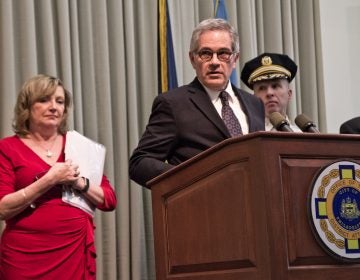 Philadelphia District Attorney Larry Krasner and other investigators announce charges against Philadelphia towing company Hooked Inc. (Kimberly Paynter/WHYY)