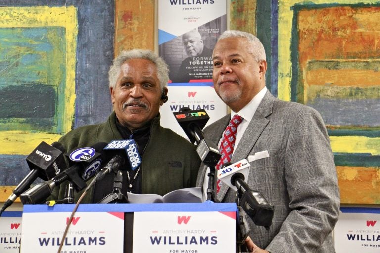 Former Philadelphia Mayor John Street (left) endorses mayoral candidate Anthony Williams during a press conference at Venango House in North Philadelphia. (Emma Lee/WHYY)