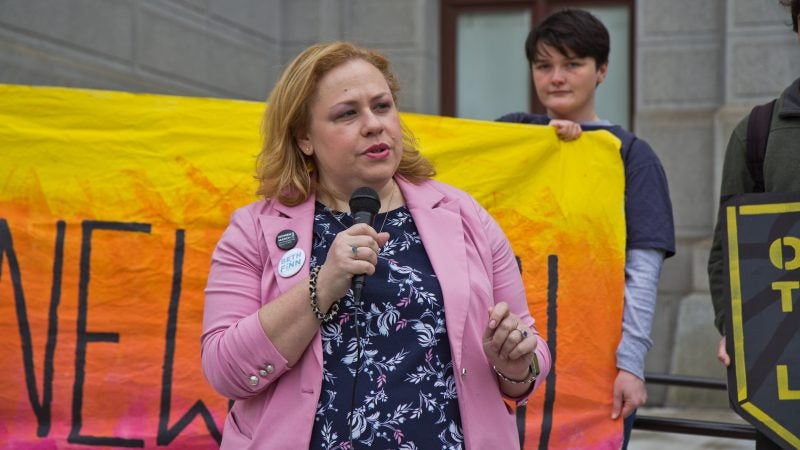 At-large city council candidate Beth Finn speaks at New Sunrise Movement’s New Green Deal Rally at City Hall Monday. (Kimberly Paynter/WHYY)