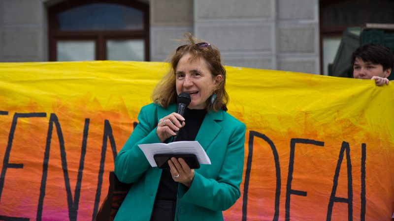 At-large city council candidate Sherrie Cohen speaks at New Sunrise Movement’s New Green Deal Rally at City Hall Monday. (Kimberly Paynter/WHYY)
