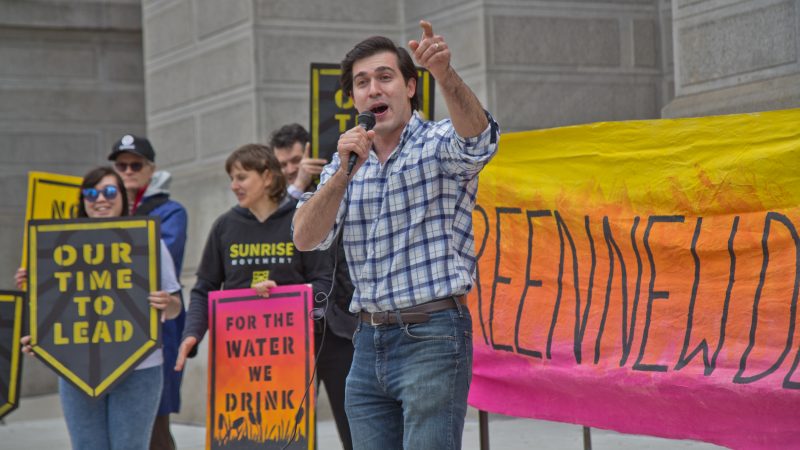 At-large city council candidate Justin DiBerardinis speaks at New Sunrise Movement’s New Green Deal Rally at City Hall Monday. (Kimberly Paynter/WHYY)