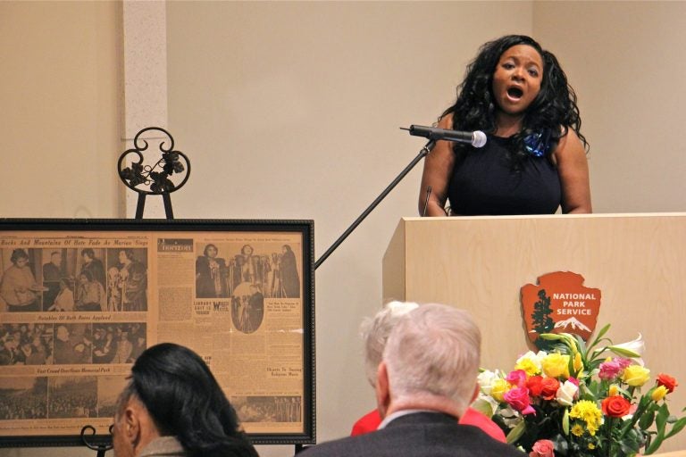 Jillian Patricia Pirtle sings the patriotic medly made famous by Marian Anderson 80 years ago on the steps of the Lincoln Memorial. The tribute was hosted by the National Park Service at the Independence Visitor Center in Philadelphia. (Emma Lee/WHYY)