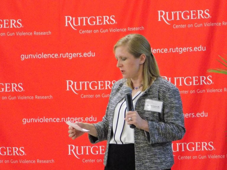 Dr. Stephanie Bonne is director of surveillance for New Jersey's Center on Gun Violence Research. She answered questions from the audience during the center's first conference at Rutgers University in New Brunswick. (Ximena Conde/WHYY)