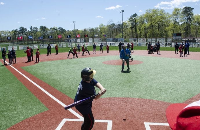 Sean Morris gets ready to hit the pitch during opening day at yhe South Jersey Field of Dreams in Absecon, New Jersey. (Anthony Smedile for WHYY)