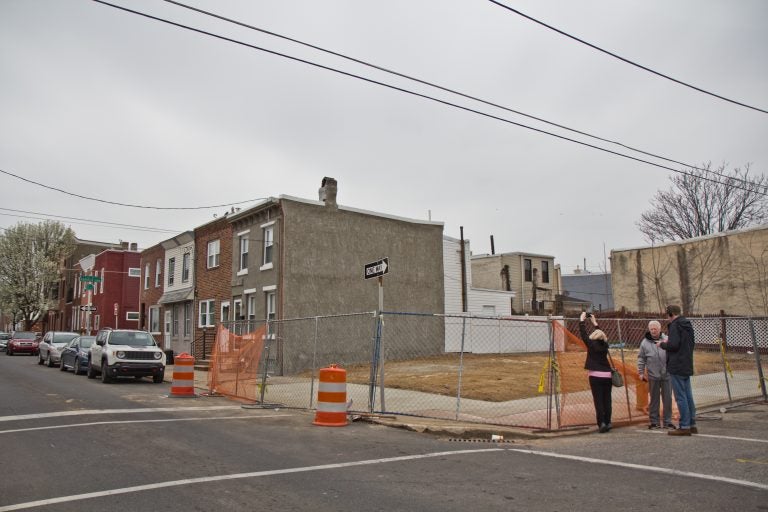 A house once stood on an empty lot on Tulip Street in Old Richmond. It collapsed because of faulty demo next door. (Kimberly Paynter/WHYY)