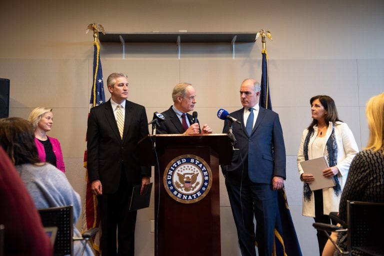 In a press conference, Del. Sen. Tom Carper, alongside Pa. Sen. Bob Casey, discusses measures pushing for a federal response to PFAS chemical contamination, following a roundtable discussion at the Horsham Township Library in Horsham, Pa. on Monday, April 8, 2019. (Kriston Jae Bethel for WHYY)
