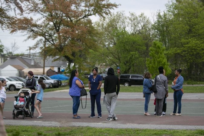 Community members gather to remember Sincere Howard and Shirleen Caban who were killed on Sunday, April 21 at Von Nieda Park in Camden. A community rally was held to create safer environment for children on Thursday, April 25, 2019. (Miguel Martinez for WHYY)