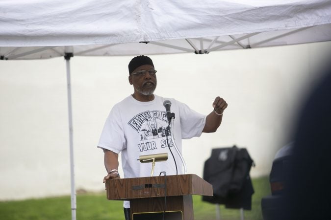 Community leader, Naim Muslim offer remarks in a community rally held in Camden to create safer environment for children on Thursday, April 25, 2019. (Miguel Martinez for WHYY)