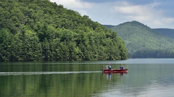 A couple spends the morning of Tuesday, July 18, 2017 fishing at Long Pine Run Reservoir in Michaux State Forest. (Markell DeLoatch/Public Opinion)