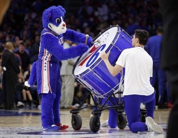 Philadelphia 76ers mascot Franklin plays the big drum during the first half in Game 5 of a first-round NBA basketball playoff series against the Brooklyn Nets, Tuesday, April 23, 2019, in Philadelphia. The 76ers won 122-100. (AP Photo/Chris Szagola)