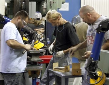 The state Department of Labor and Industry reported an increase in new jobs in March. (Keith Srakocic/AP Photo)