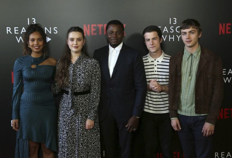 Alisha Boe, from left, Katherine Langford, Derek Luke, Dylan Minnette and Miles Heizer arrive at the 