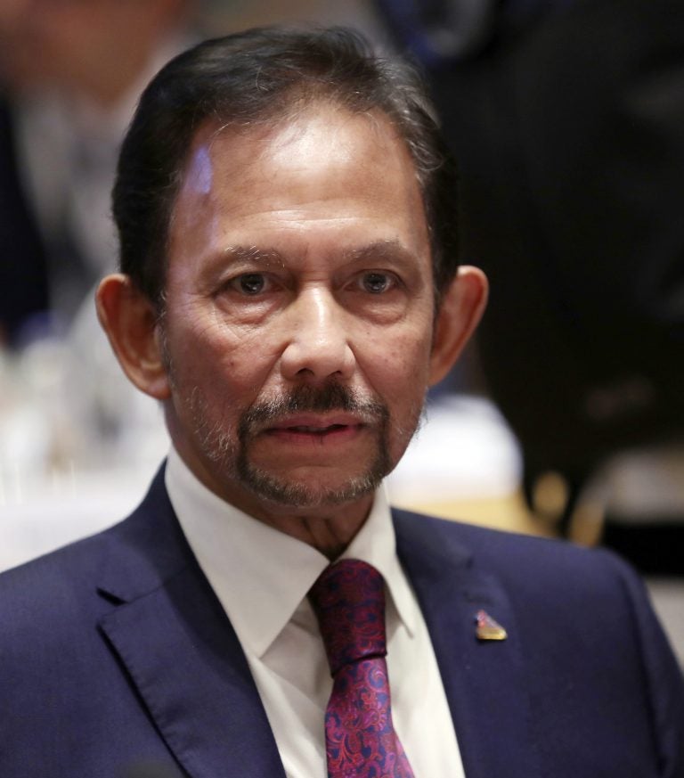 In this Oct. 18, 2018, file photo, Brunei's Sultan Hassanal Bolkiah attends a round table meeting at the ASEM 12 in Brussels. (Francisco Seco/AP Photo, File)