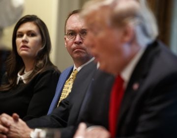 White House press secretary Sarah Sanders and acting White House Chief of Staff Mick Mulvaney listen as President Donald Trump speaks during a meeting with NATO Secretary General Jens Stoltenberg in the Cabinet Room of the White House, Tuesday, April 2, 2019, in Washington. (Evan Vucci/AP Photo)