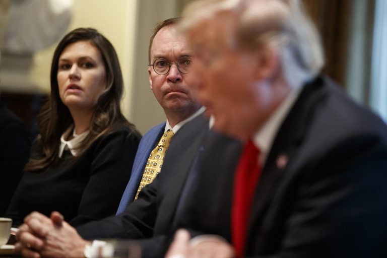 White House press secretary Sarah Sanders and acting White House Chief of Staff Mick Mulvaney listen as President Donald Trump speaks during a meeting with NATO Secretary General Jens Stoltenberg in the Cabinet Room of the White House, Tuesday, April 2, 2019, in Washington. (Evan Vucci/AP Photo)