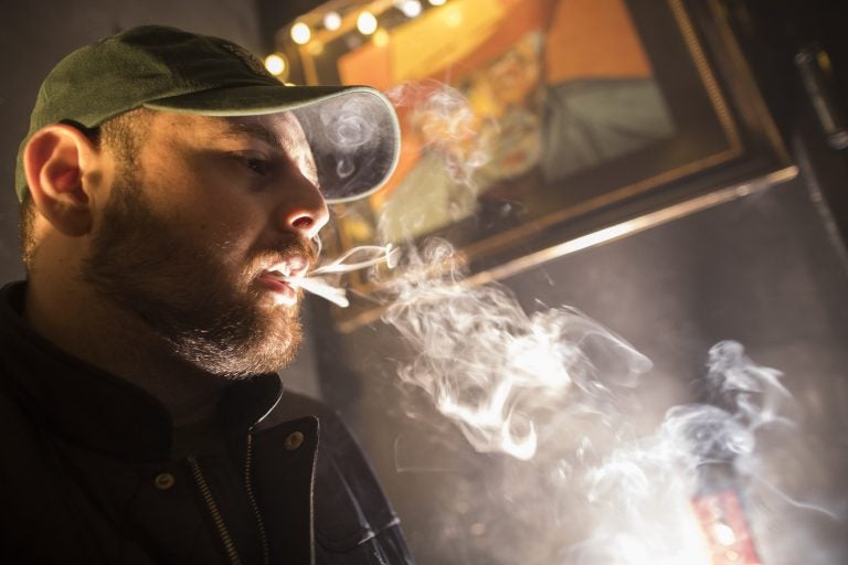 In this Friday, March 29, 2019 photo, a man smokes marijuana at a Spleef NYC canna-cocktail party in New York. As more states make it legal to smoke marijuana, some government officials, researchers and others worry what that might mean for one of the country's biggest public health successes: curbing cigarette smoking. (Mary Altaffer/AP Photo)