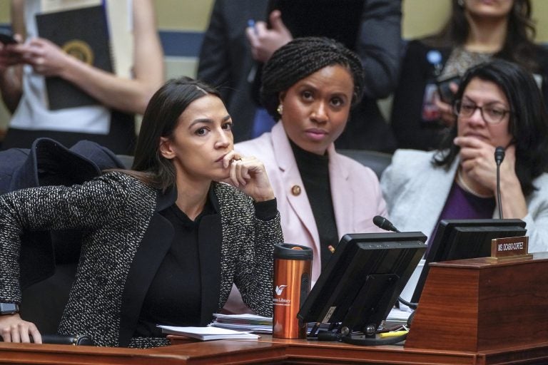 Rep. Alexandria Ocasio-Cortez, D-N.Y., (left), joined by Rep. Ayanna Pressley, D-Mass., and Rep. Rashida Tlaib, D-Mich., listens during a House Oversight and Reform Committee meeting, on Capitol Hill in Washington, Tuesday, Feb. 26, 2019. House Democrats are rounding the first 100 days of their new majority taking stock of their accomplishments, noting the stumbles and marking their place as a frontline of resistance to President Donald Trump. (J. Scott Applewhite/AP Photo)