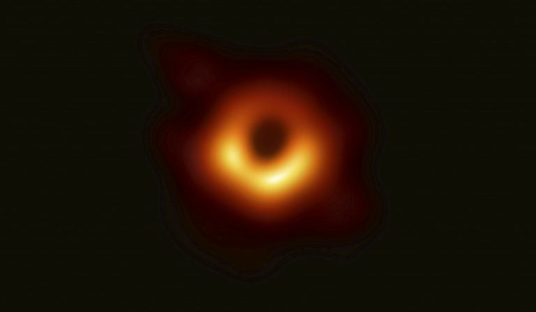 This image released Wednesday, April 10, 2019, by Event Horizon Telescope shows a black hole. Scientists revealed the first image ever made of a black hole after assembling data gathered by a network of radio telescopes around the world. (Event Horizon Telescope Collaboration/Maunakea Observatories via AP)