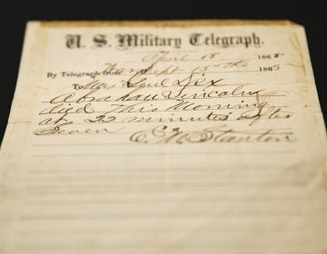 This photo shows a handwritten notification of President Abraham Lincoln's death that is being offered for sale by Raab Collection in Ardmore, Pa., Thursday, April 11, 2019. The telegram was written inside a home where Lincoln was rushed after being shot at Ford's Theater on April 14, 1865. (Matt Rourke/AP Photo)
