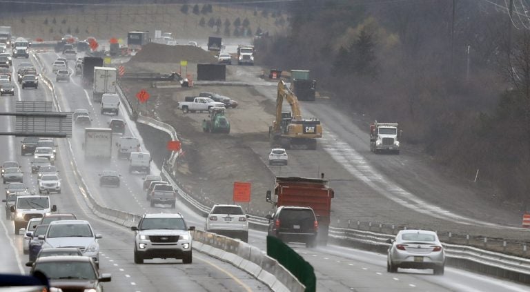 In a Friday, April 12, 2019 photo, Interstate Highway 75 construction continues in Troy, Mich. After passing waves of tax cuts in recent years, some Republican-dominated states have decided it's time to make a big exception, calling for tax increases to fix roads crumbling from years of low funding and deferred maintenance. (Carlos Osorio/AP Photo)