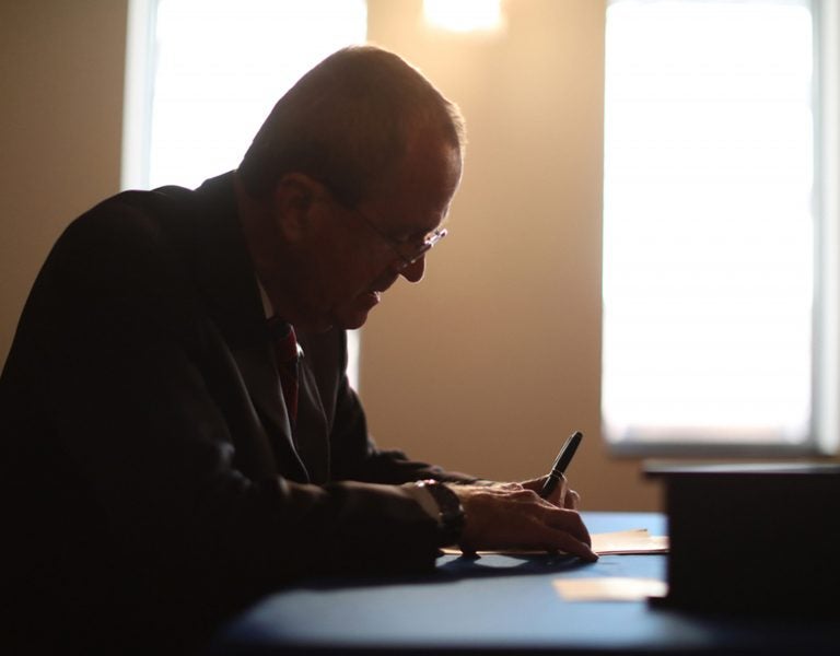 In this photo provided by the New Jersey Office of the Governor, N.J. Gov. Phil Murphy signs the Medical Aid in Dying for the Terminally Ill Act Friday, April 12, 2019 at the New Jersey Statehouse in Trenton, N.J. New Jersey is the seventh state to enact a law permitting terminally ill patients to seek life ending medication. (New Jersey Office of the Governor via AP)