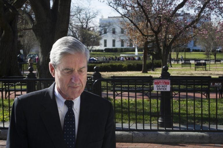 In this March 24, 2019, file photo, Special Counsel Robert Mueller walks past the White House after attending services at St. John's Episcopal Church, in Washington. (Cliff Owen/AP Photo, File)