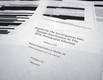 Four pages of special counsel Robert Mueller report on the witness table in the House Intelligence Committee hearing room on Capitol Hill, in Washington, Thursday, April 18, 2019. (Cliff Owen/AP Photo)