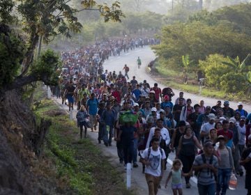 Central American migrants, part of a caravan hoping to reach the U.S. border, move on the road in Escuintla, Chiapas State, Mexico, Saturday, April 20, 2019. Thousands of migrants in several different caravans have been gathering in Chiapas in recent days and weeks. (Moises Castillo/AP Photo)