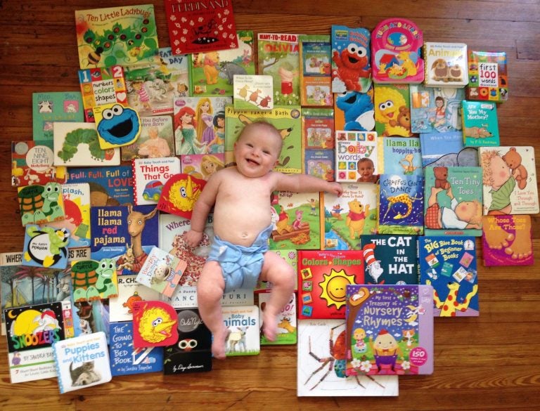 Josie Shipley received many books for her 6-month birthday. Her mother, Nicole Chaney, requested extras to donate — 60 in all — to new mothers in 2015 at the Hospital of the University of Pennsylvania, where she worked. (Courtesy of Nicole Chaney) 