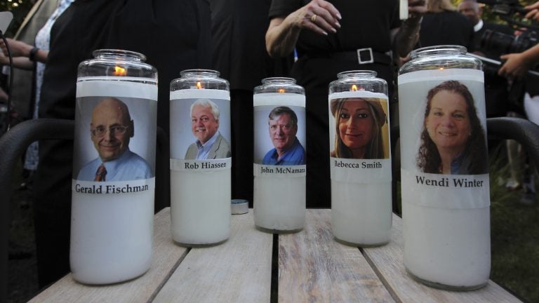The photos of five people slain in the Capital Gazette newsroom adorn candles at a vigil in June. The attack was mentioned in the analysis of Reporters Without Borders’ annual World Press Freedom Index. The photos of five people slain in the Capital Gazette newsroom adorn candles at a vigil in June. The attack was mentioned in the analysis of Reporters Without Borders' annual World Press Freedom Index. (Jose Luis Magana/AP)